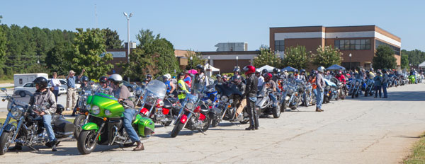 Riders get ready to depart from Walton EMC headquarters for the 2013 Charity Ride. The event raised $2,400 for Camp Sunshine, an organization serving children with cancer.