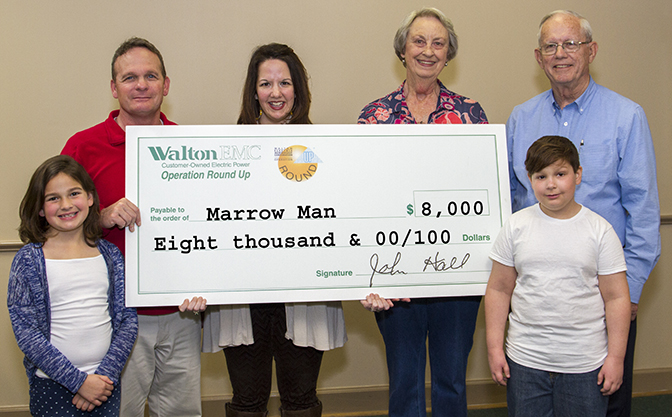 Financial donation from Walton EMC to local communities
